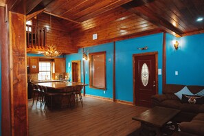 Luxury Cabin, River View | Living area | Computer monitors