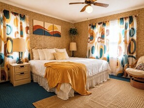 A bedroom with a bed, two bedside tables, a ceiling fan, and a window with curtains. - Beach Front. The Plum Pad. Sunset, Surf & 70s Soul (Milton)