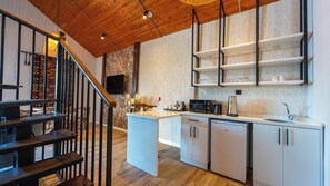 Mini-fridge, stovetop, coffee/tea maker, electric kettle