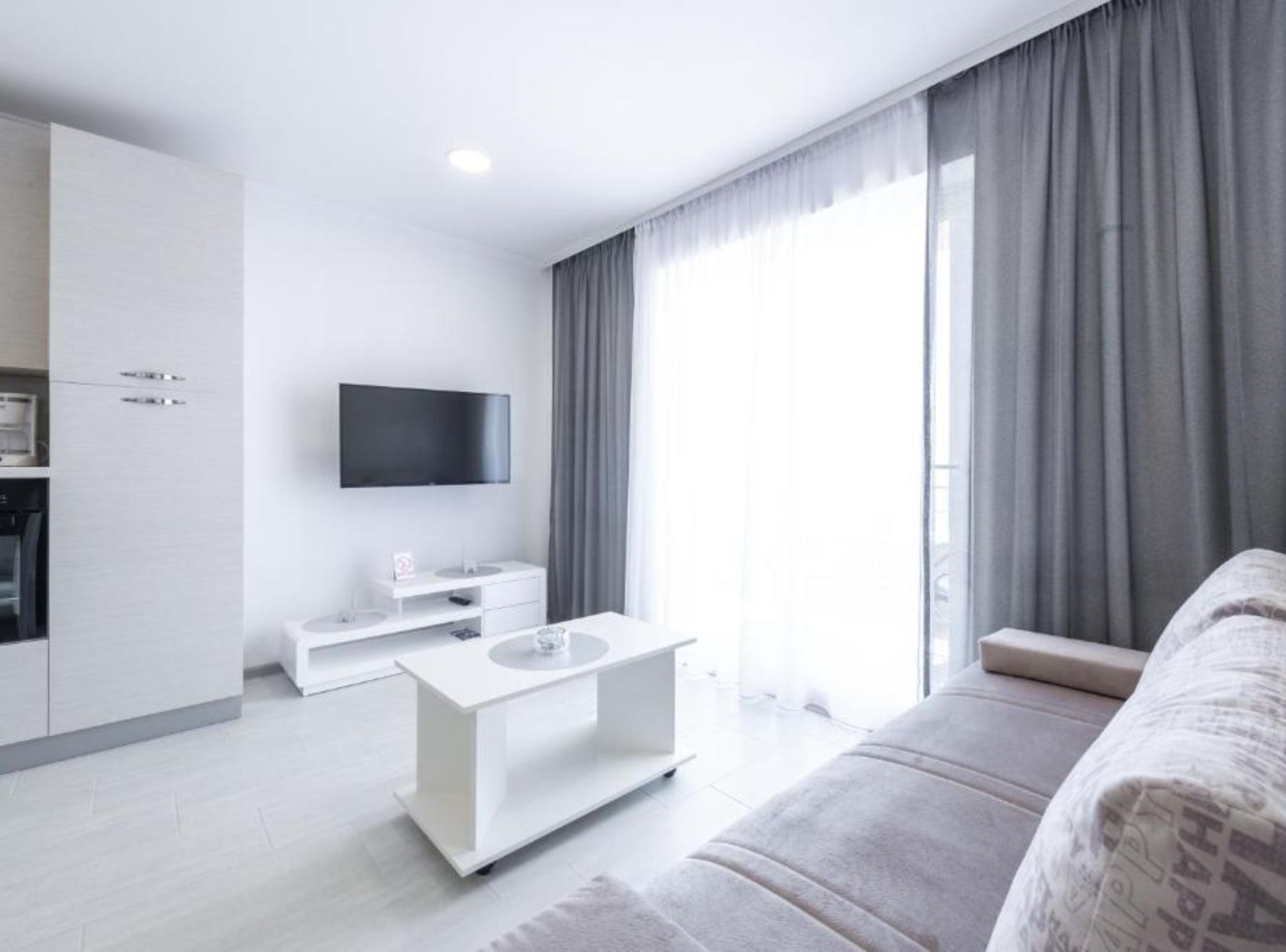 Apartment (Superior One Bedroom Apartment with S) | Living room | 32-inch flat-screen TV with cable channels