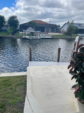 Property grounds - 3-bedroom canal house with  heated pool in soothing Cape Coral with AC (Cape Coral)