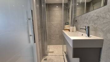 Shower, free toiletries, hair dryer, towels