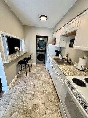 Private kitchen - Beach Retreat: Modern 1-Bedroom • Pet Friendly (Clearwater)