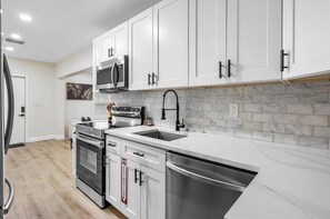 Private kitchen - Steps to Gulfstream Park - Modern 2BR Beach Retreat + BBQ in Ocean Ridge (Boynton Beach)