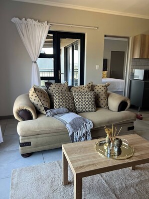 Apartment, 1 Bedroom, Balcony, River View | Living area - Amazing 1BR With River View in Waterfall-midrand (Johannesburg)