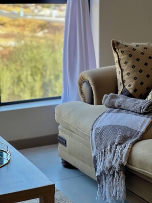 Apartment, 1 Bedroom, Balcony, River View | Living area - Amazing 1BR With River View in Waterfall-midrand (Johannesburg)