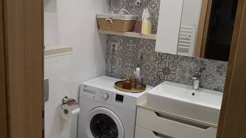 Hair dryer, towels, soap, toilet paper