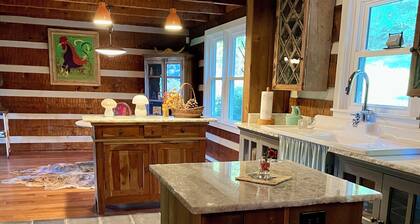 Charming log home with acres of hiking trails