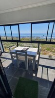 Apartamento, 2 quartos, para fumantes, piscina particular | Sacada