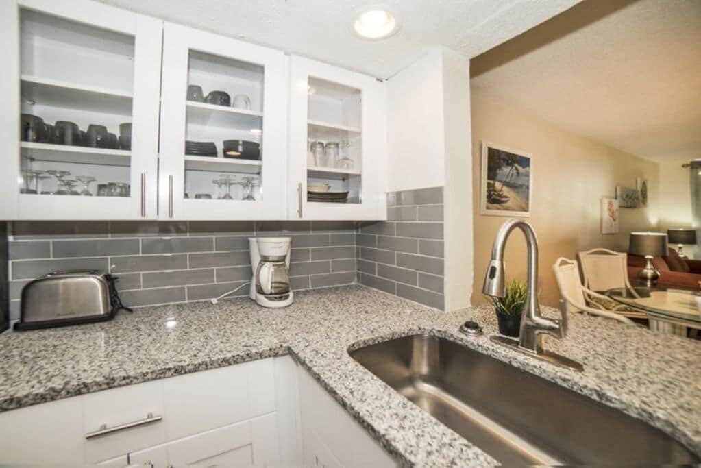 Fridge, coffee/tea maker, cookware/dishes/utensils