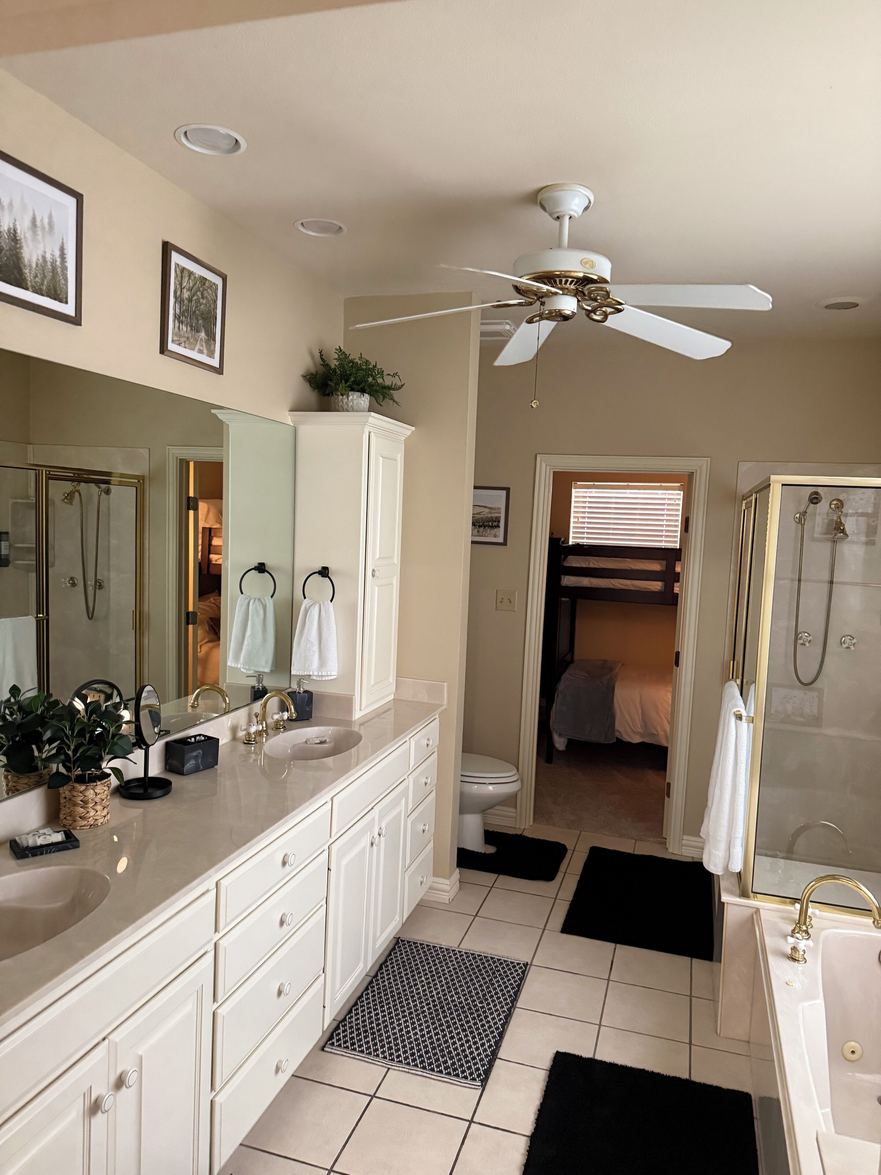 Shower, jetted bath, towels, soap