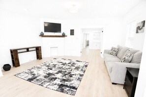 Living area -     Cozy Atlanta Stay Sleeps 4 Near ATL. Free Wifi + Self check in (College Park)