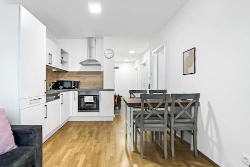 Deluxe Apartment, Balcony | Private kitchen | Espresso maker, electric kettle, dining tables