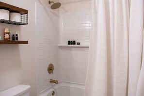 Hair dryer, towels, soap, shampoo