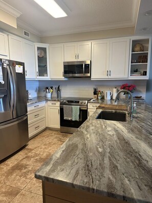Fridge, microwave, oven, stovetop - tunning Oceanview Condo | 3BR | Coastal Luxury in Palm Coast (Palm Coast)