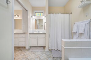 Shower, jetted bath, hair dryer, towels