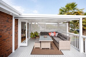 Terrace/patio - Stylish Howick Home with Sunny Covered Deck | Marigold by Homello (Auckland)