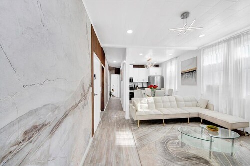 Luxury 4BR Sleeps 16 • Free Parking • Walk to Train • Near NYC
