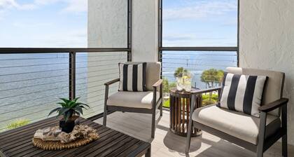 Fully Updated Waterfront Condo with Screened-in Balcony; Watch Boats Glide By & Dolphins Frolic