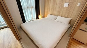 Habitación doble superior, balcón | Cortinas opacas, sistema de insonorización, wifi gratis y ropa de cama