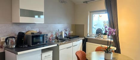 Fridge, microwave, coffee/tea maker, electric kettle