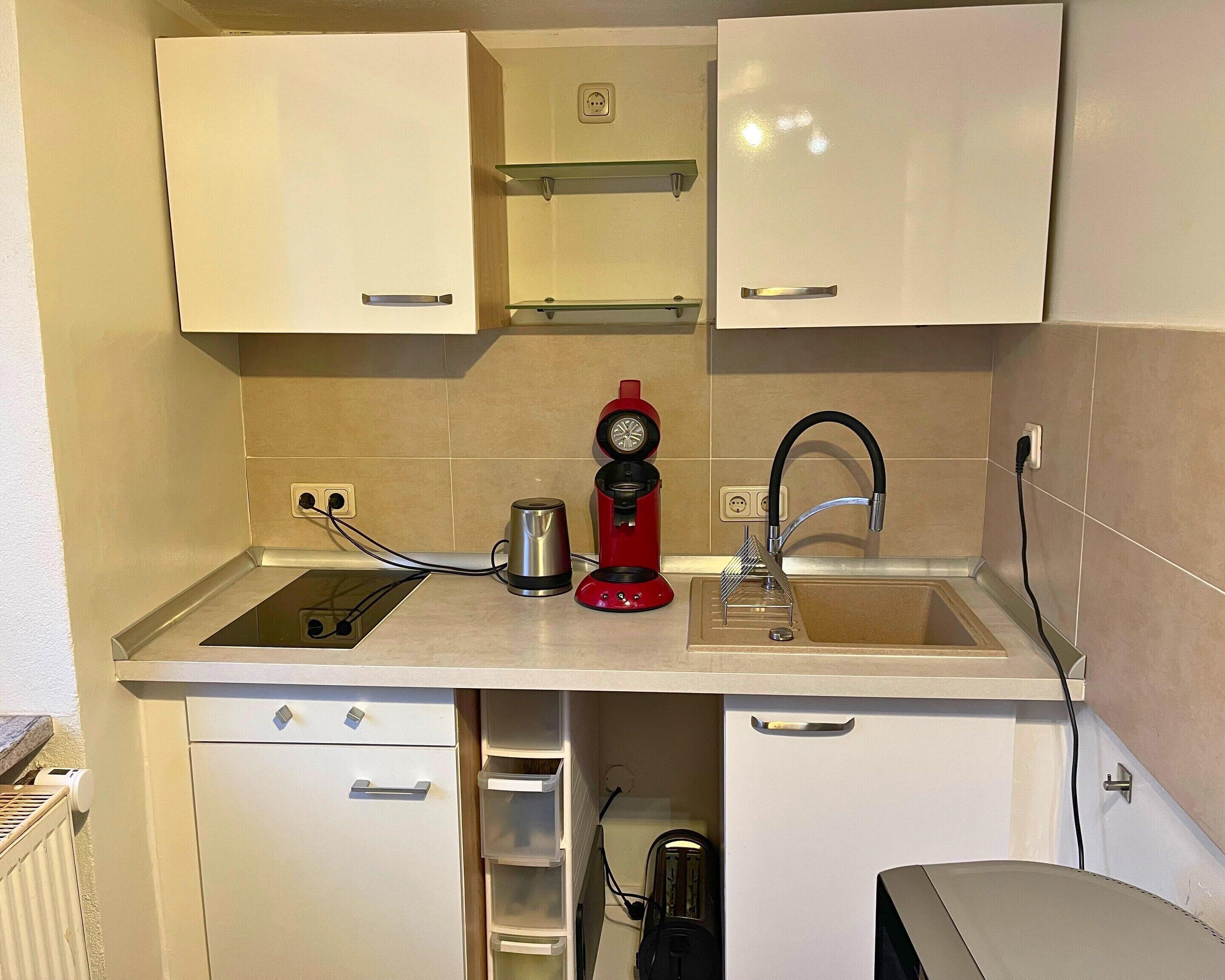 Deluxe Apartment, 2 Bedrooms | Private kitchen | Fridge, microwave, coffee/tea maker, electric kettle