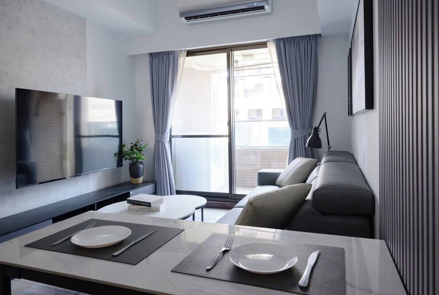 Cozy & Stylish Living Room:• 65" Smart TV & TV Channels• Comfy Sofa• Coffee Tables• Open Space with Kitchen & Dining Area
