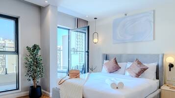 Superior Apartment, 1 Bedroom, Balcony, City View | In-room safe, desk, laptop workspace, iron/ironing board