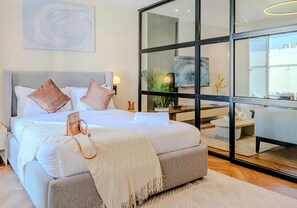 In-room safe, desk, laptop workspace, iron/ironing board - Stella Stays Al Malqa Furnished Apts (Riyadh)