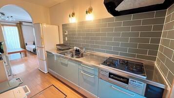 Fridge, microwave, cookware/dishes/utensils
