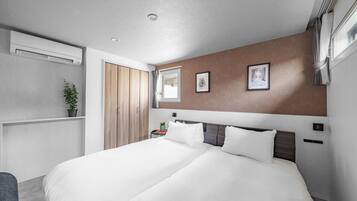 1 dormitorio, tabla de planchar con plancha, wifi gratis y ropa de cama
