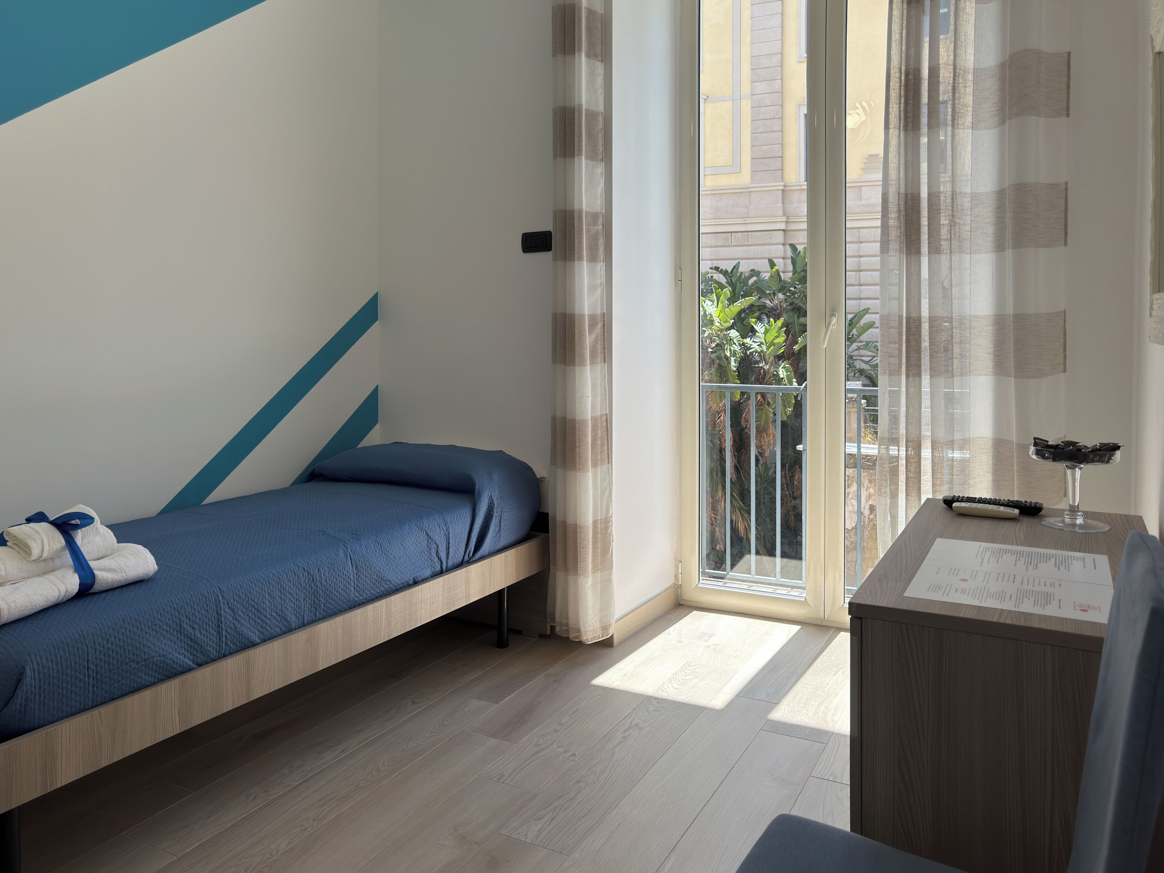 Habitación triple, vistas a la ciudad