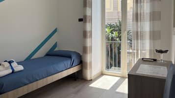 Habitación triple, vistas a la ciudad