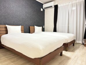 A double bed with wooden headboards, a dark textured wall, and a white curtain. - 71 Mtview Building A 12minute walk from Kawaguc / Minamitsuru District Yamanashi (Minamitsuru District)