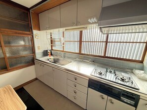 Fridge, microwave, stovetop, cookware/dishes/utensils
