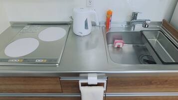Fridge, stovetop, cookware/dishes/utensils