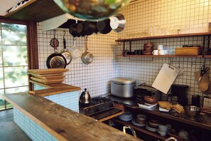 Fridge, microwave, stovetop, cookware/dishes/utensils
