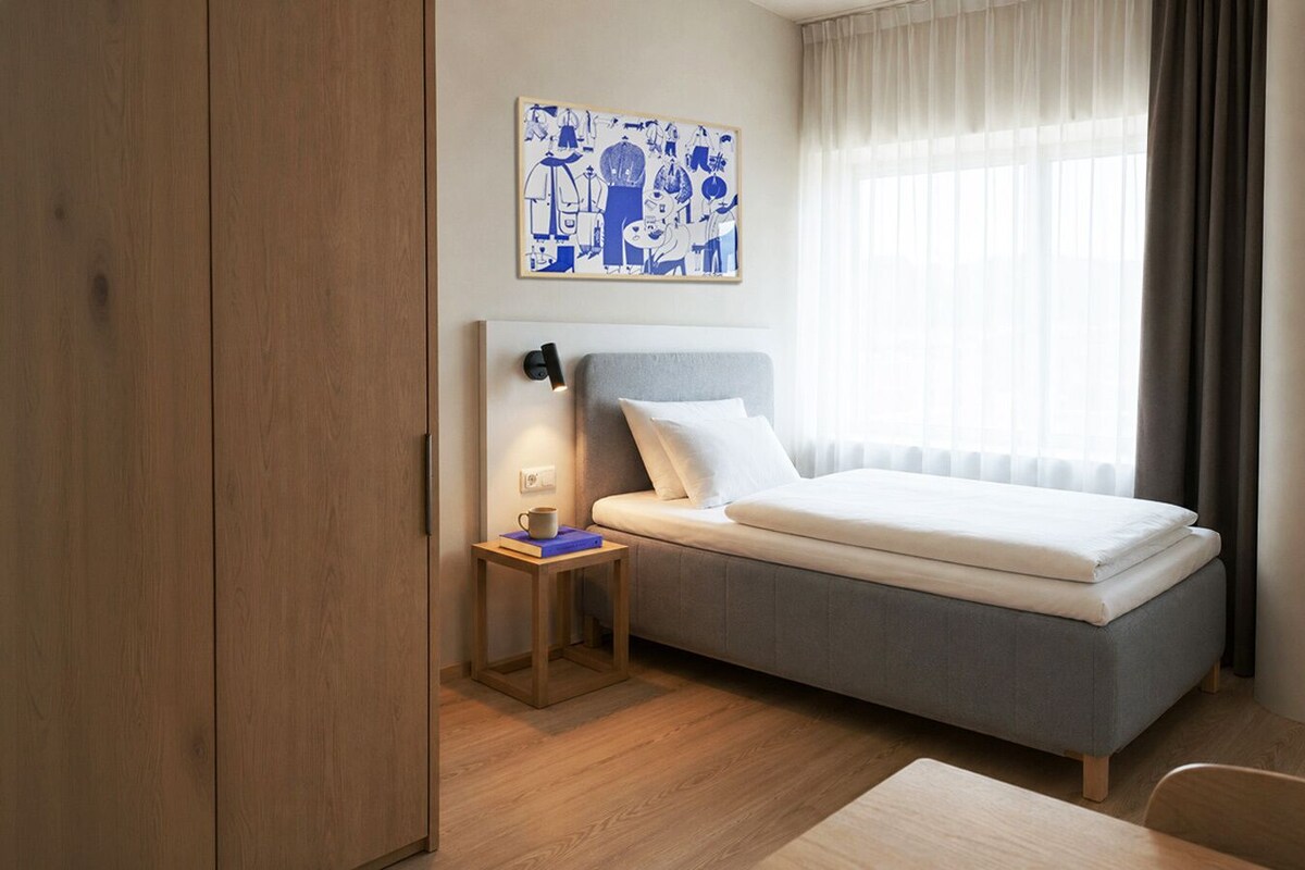 Standard Single Room | Blackout drapes, iron/ironing board (on request), WiFi (free)