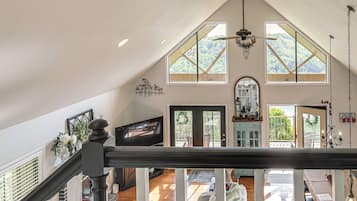 TV, fireplace, books