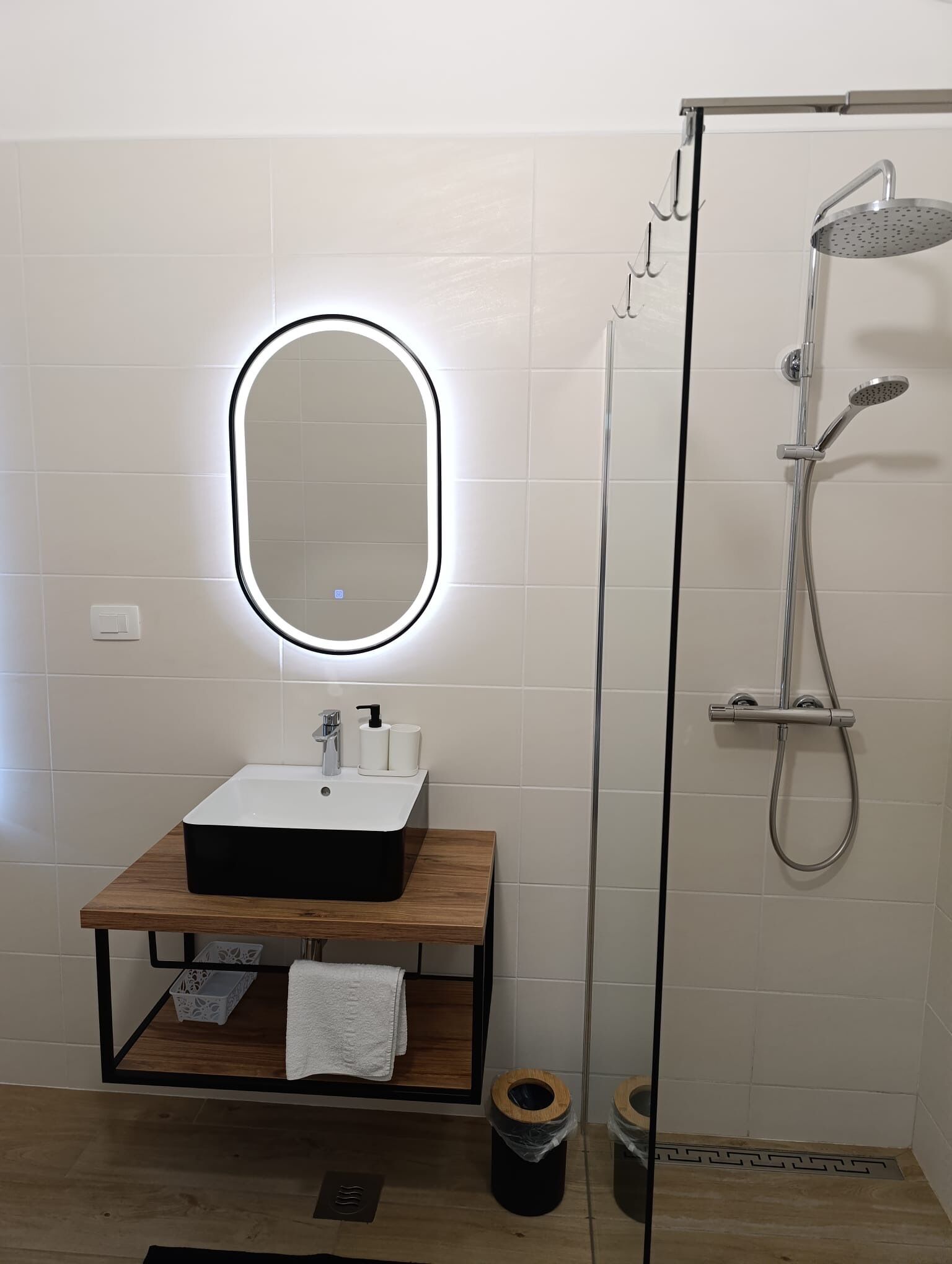 Shower, towels, soap, toilet paper