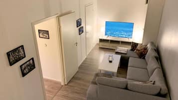 Appartement familial, 4 chambres, patio, vue sur le jardin | Aire de séjour