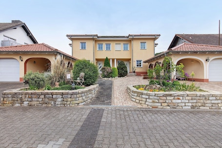Exterior. Villa am Keltenberg, La Stella – Charming Room with Terrace, AC, and Wi-Fi