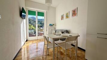 Apartment (1 Bedroom) | Living area | TV