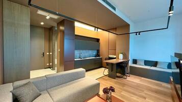 Apartamento, vista para a cidade | Área de estar