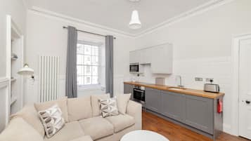 Apartment | Living area | 24-inch Smart TV with digital channels
