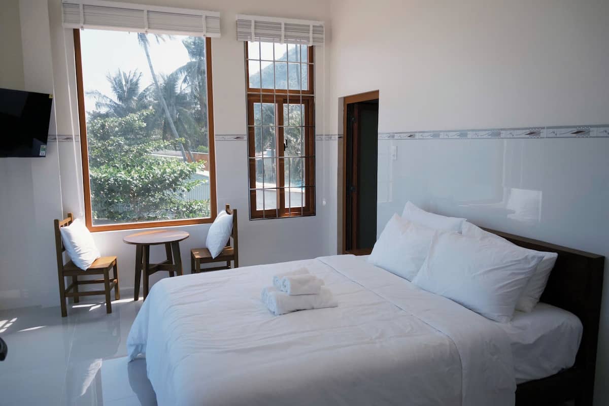 Habitación Deluxe doble | Minibar, escritorio, wifi gratis y ropa de cama