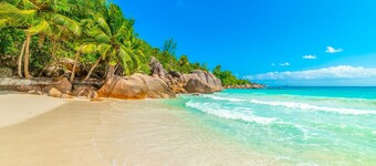 Seychelles Sun-Soaked Sailing: A Pristine Beach Experience from Praslin