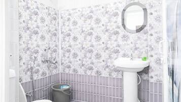 Shower, rainfall showerhead, slippers, towels