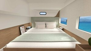 Ein kompakter, moderner Schlafzimmerraum mit Bett, Nachttischen, einem Fenster mit Ausblick und einem kleinen Oberlicht.