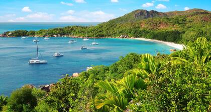 Seychelles Sun-Soaked Sailing: A Pristine Beach Experience from Praslin